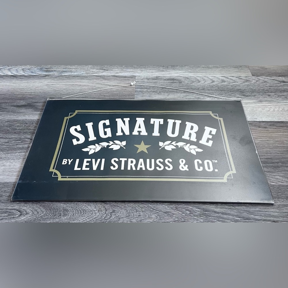 VINTAGE SIGNATURE LEVI AND STRAUSS SIGN